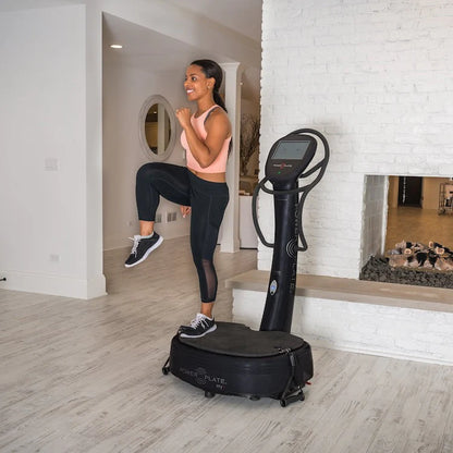 A woman exercising on a Power Plate vibration machine